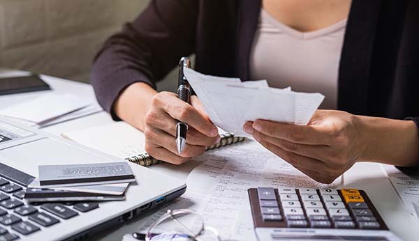 an accountant adding numbers